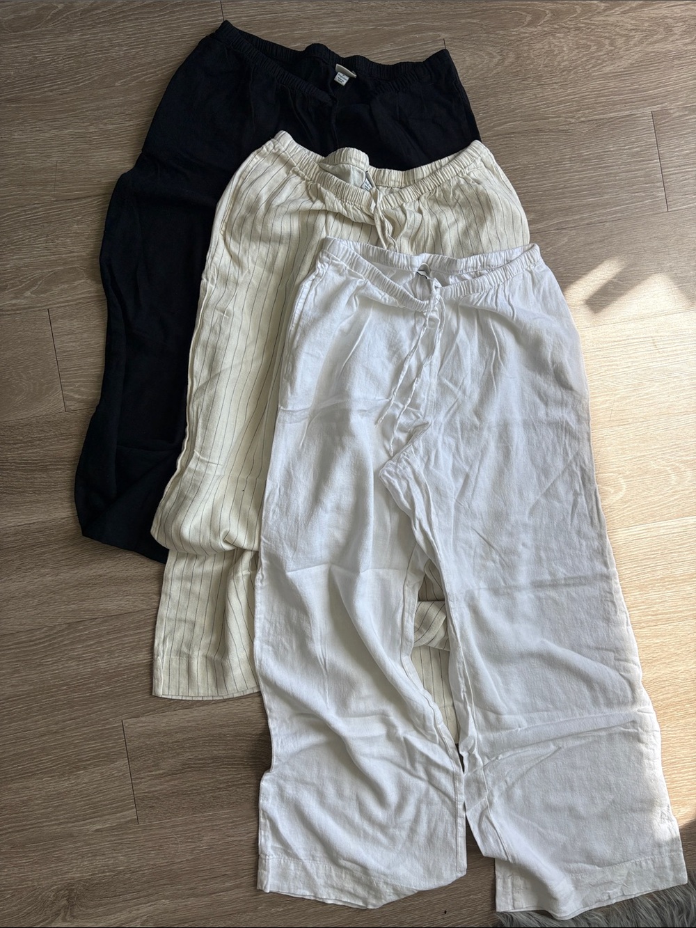 3-Pack Lightweight Linen Blend Pants - Black, Cream pinstripe, White. A New Day